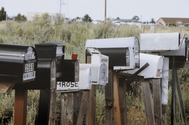 Picture with many mailboxes together representing the communication chaos of our time.