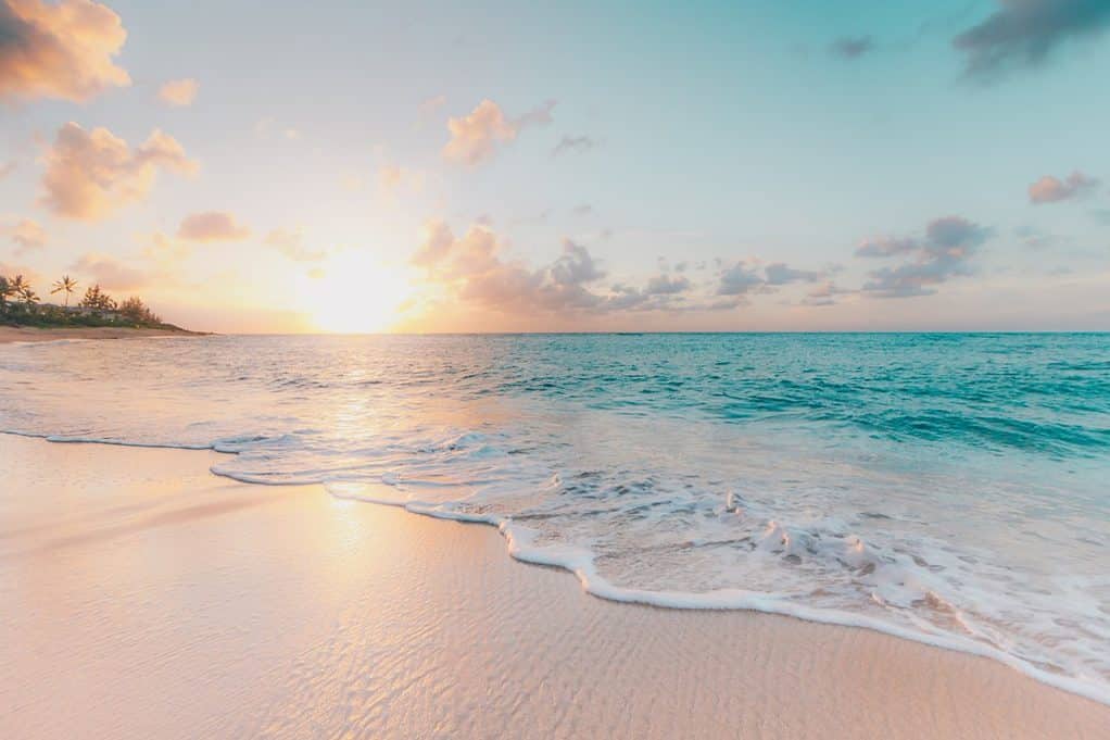 photo of a beach at sunset